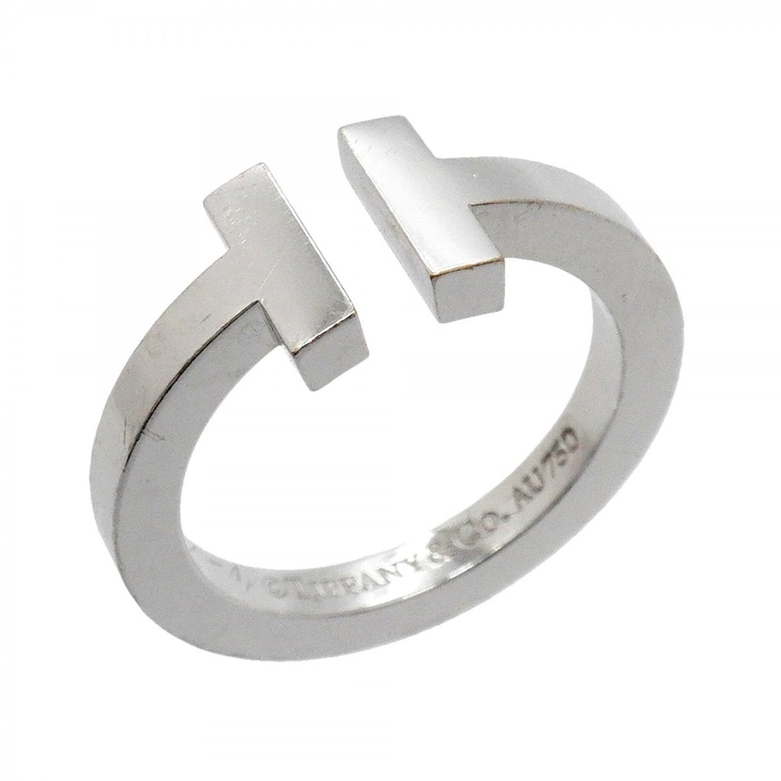 Tiffany & Co. T-Square Ring, 18K White Gold, Size 12.5 (Women's): --- Catalog ---Category: SizeJP Size: 12.5US Size: 6.5Category: DesignType: Band ringGender: WomenMaterial: White gold (18K)Category: GeneralBrand: Tiffany--- Item List ---Section: ConditionRanking: R
