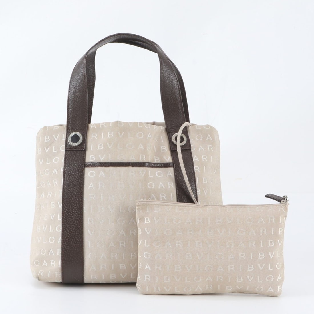 Excellent condition Bvlgari Logomania handbag with pouch, leather and canvas tote bag, handbag,: --- Catalog ---Category: SizeSize (HxWxD): 24cm x 29cm x 8cm / 9.44'' x 11.41'' x 3.14''Category: DesignType: Handbag, Pouch, Tote bagColor: BrownGender: WomenMaterial: Leather , Canvas Category: Gene