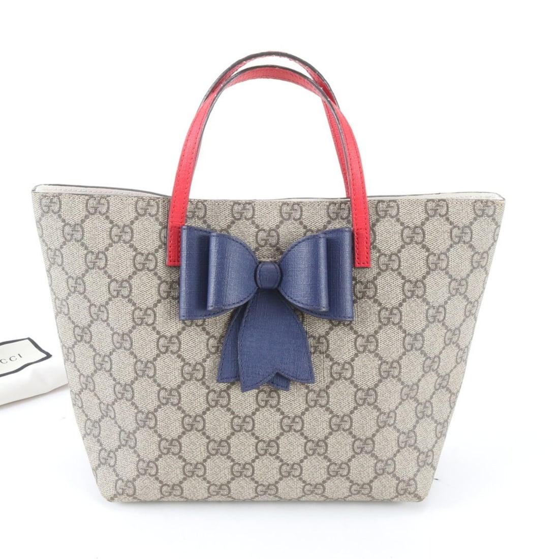 Excellent condition Gucci GG Supreme ribbon motif leather handbag/tote bag (model 457232) for women.: --- Catalog ---Category: SizeSize (HxWxD): 20cm x 20cm x 10cm / 7.87'' x 7.87'' x 3.93''Category: DesignType: Handbag, Tote bagColor: Beige, Navy, Red colorGender: WomenMaterial: Leather , Coated canv