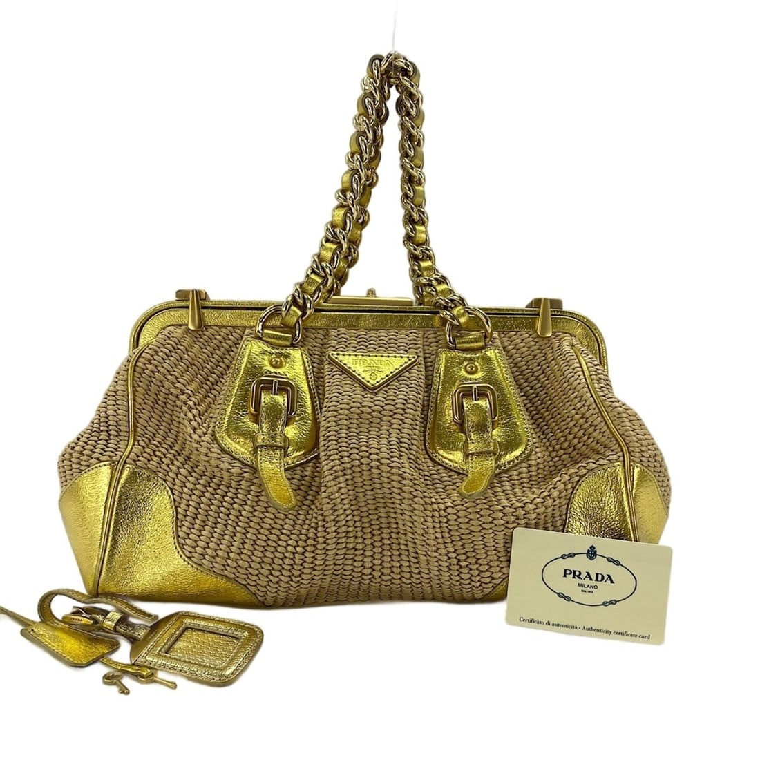 Prada handbag, gold: --- Catalog ---Category: SizeSize (HxWxD): 20cm x 31.5cm x 16cm / 7.87'' x 12.4'' x 6.29''Category: DesignType: HandbagColor: GoldGender: WomenCategory: GeneralBrand: PradaCountry of Origin: Italy--- 