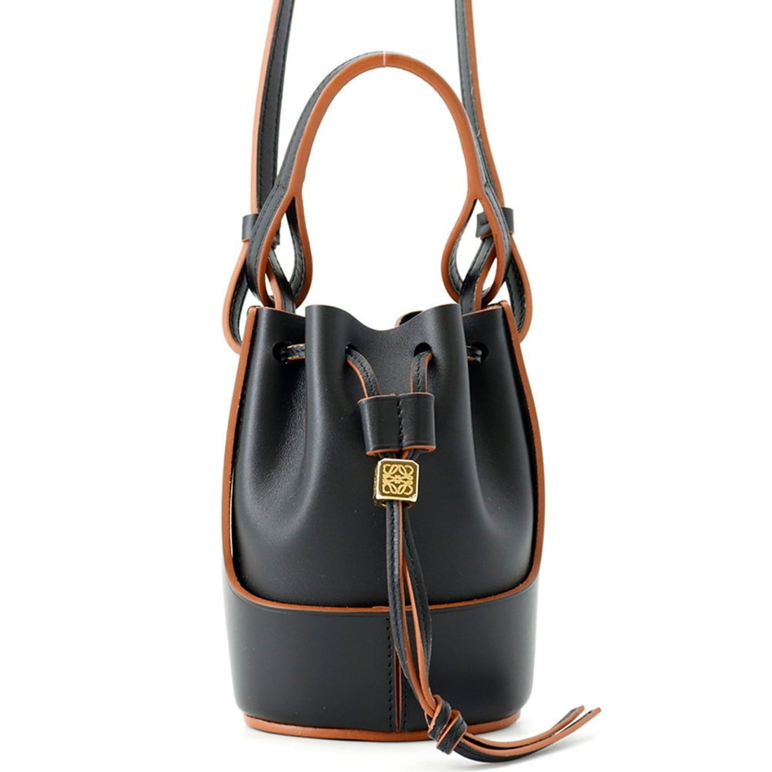 Loewe Balloon Nano Bag Leather Shoulder A710R85X01 LOEWE Black Handbag: --- Catalog ---Category: SizeSize (HxWxD): 13.5cm x 9cm x 6.5cm / 5.31'' x 3.54'' x 2.55''Category: DesignType: Shoulder bagColor: Black, BrownGender: WomenMaterial: Leather Category: GeneralBrand: Lo
