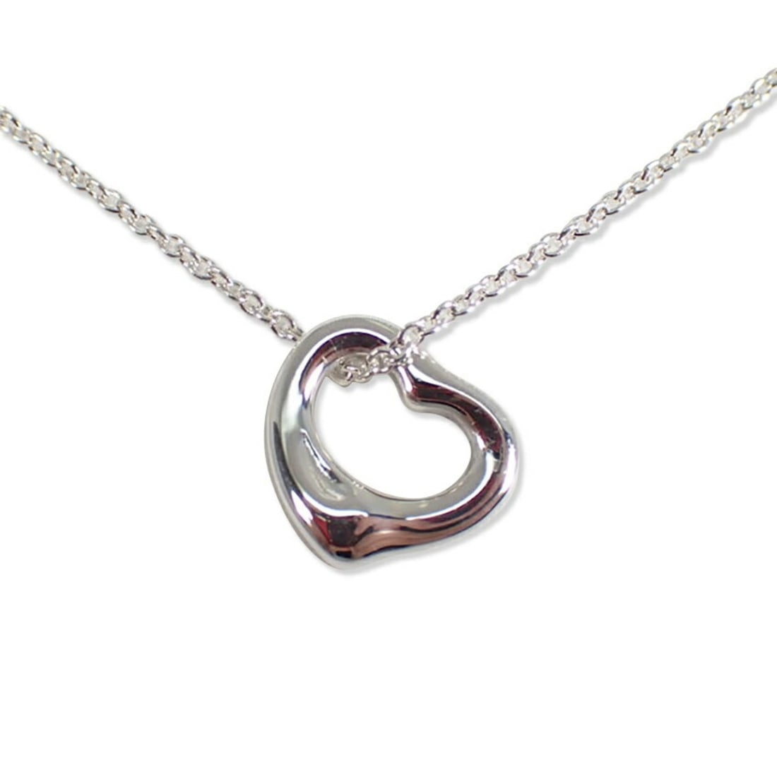 TIFFANY & Co. 925 Heart Pendant Necklace: --- Catalog ---Category: SizePendant Size: 9.6mm x 10.7mm / 0.37'' x 0.42''Neck Circumference: 40.5 cm / 15.94''Category: DesignGender: WomenMaterial: Sterling silver 925Necklace Type: Pendant
