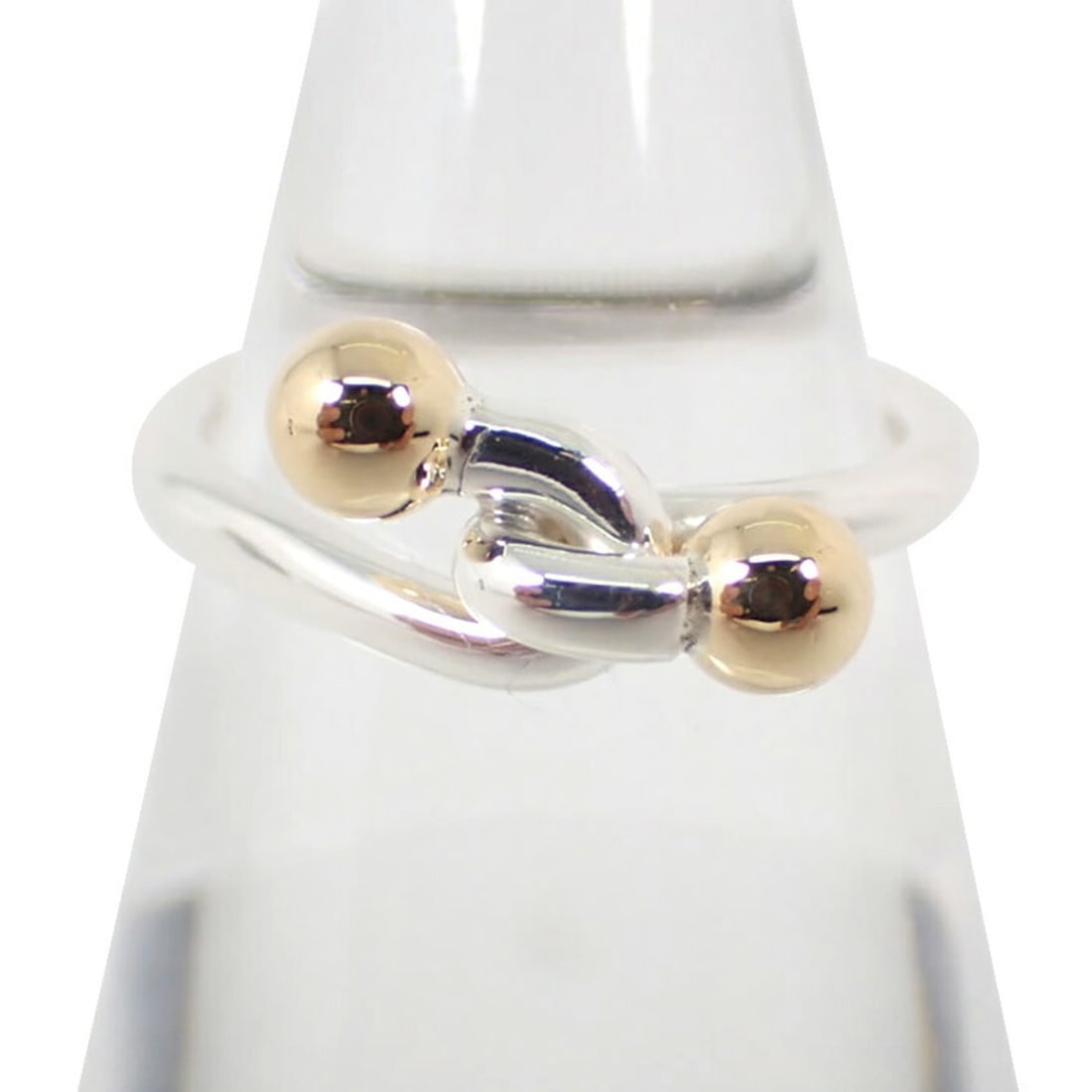 TIFFANY & Co. 925 750 Love Knot Ring, Size 7.5: --- Catalog ---Category: SizeUS Size: 4Brand Size: 47Category: DesignType: Band ringGender: WomenMaterial: Sterling silver 925, Yellow gold (18K)Category: GeneralBrand: Tiffany--- Item List ---Section