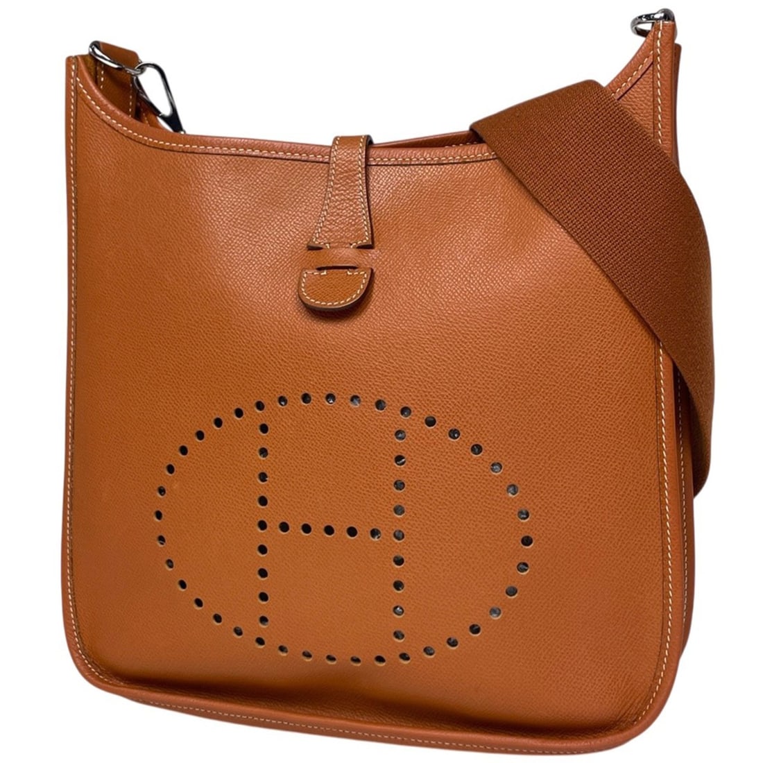 Hermes Evelyne II Perforated H Logo Shoulder Bag, Veau Epsom Leather, Cognac, Women's: --- Catalog ---Category: SizeSize (HxWxD): 26cm x 28cm x 6cm / 10.23'' x 11.02'' x 2.36''Category: DesignType: Shoulder bagColor: CognacGender: WomenMaterial: Epsom leather Category: GeneralBrand: Her