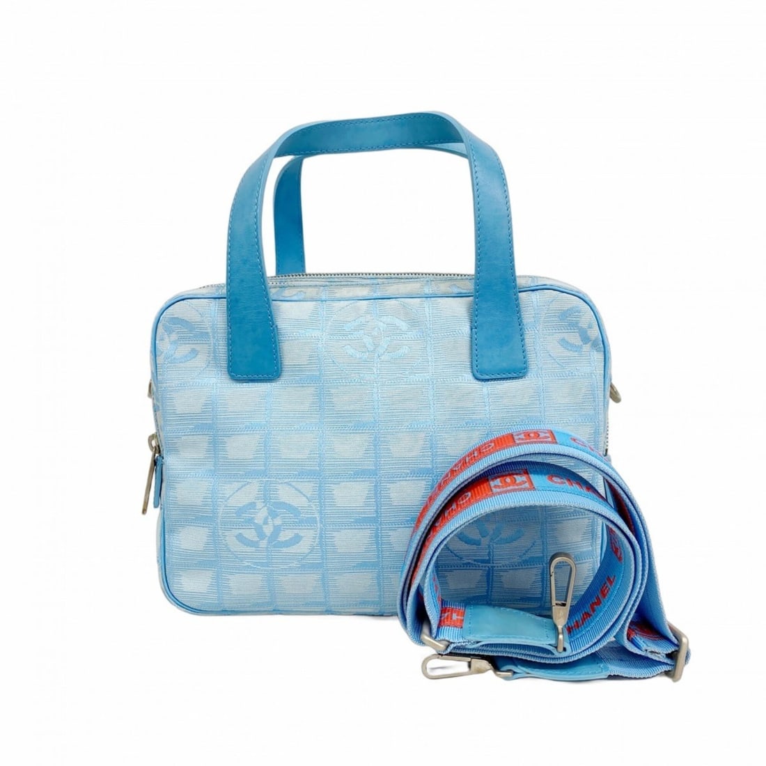 Chanel New Travel Nylon Handbag, Blue, 2-way bag for women: --- Catalog ---Category: SizeSize (HxWxD): 19cm x 25cm x 8.5cm / 7.48'' x 9.84'' x 3.34''Category: DesignType: HandbagColor: BlueGender: WomenMaterial: Nylon Hardware Color: SilverCategory: GeneralBra