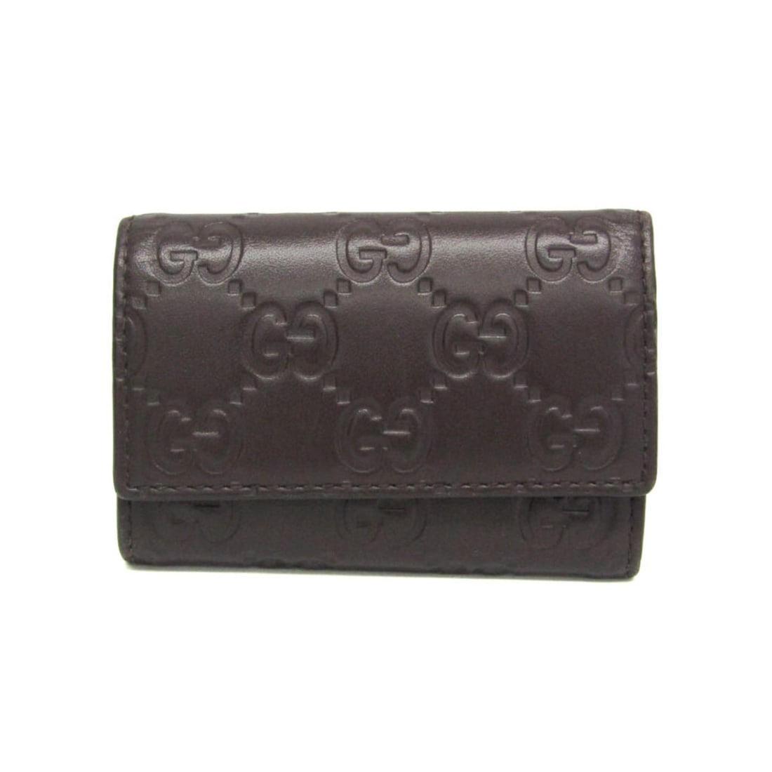 Gucci Guccissima 138093 Men,Women Leather Key Case Dark Brown: --- Catalog ---Category: DesignType: KeycaseColor: Dark brownGender: Men,WomenClosure: Snap (hook)Material: Leather Inner Pocket: Open pocket 1Number of Key Hooks: 6Category: GeneralLine: GuccissimaBr