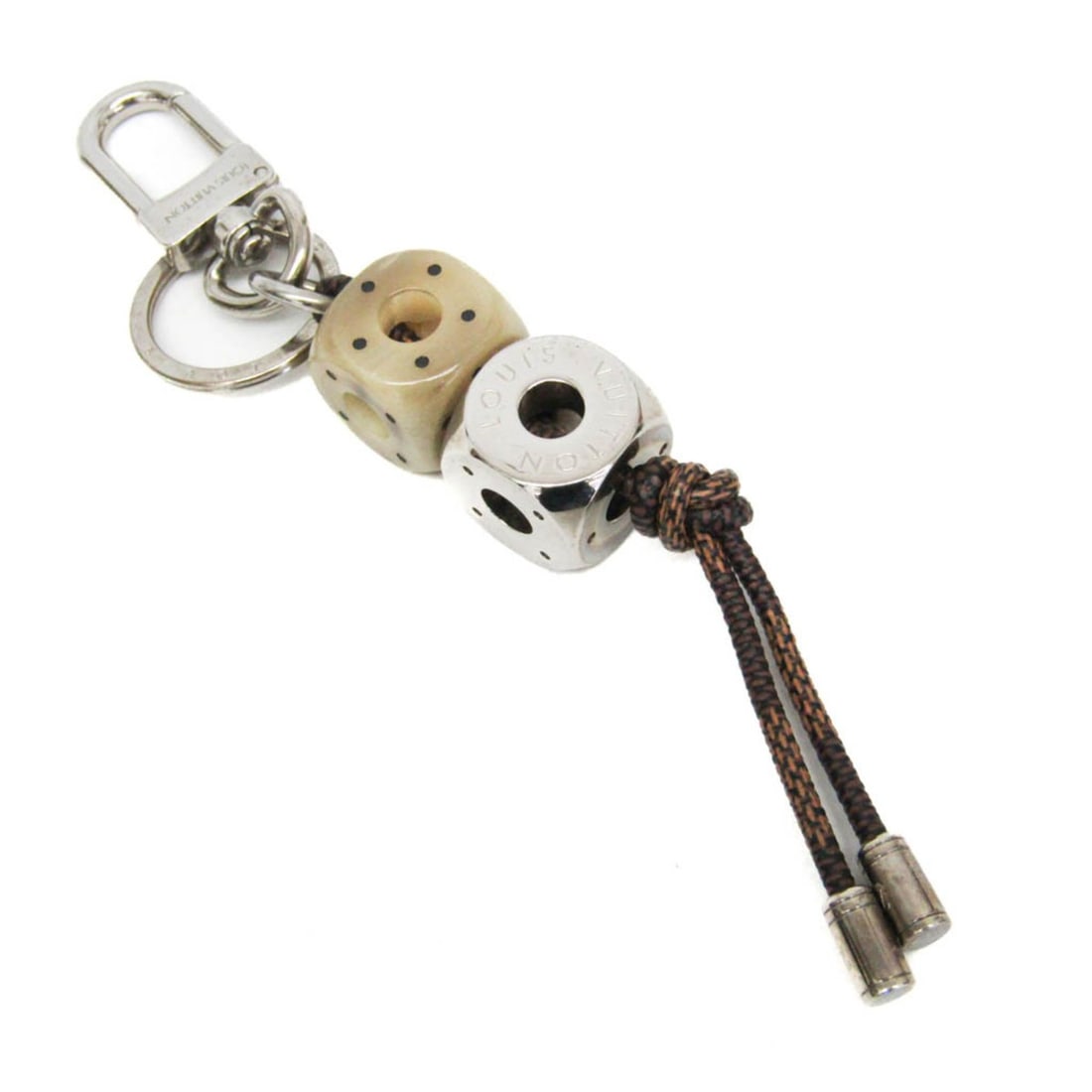 Louis Vuitton Damier Dice Key Holder M66734 Keyring (Silver,Brown): --- Catalog ---Category: SizeWeight: 76.2g / 2.68oz.Charm Size: 10cm x 2cm / 3.94'' x 0.79''Size (HxWxD): 15cm x 2cm / 5.9'' x 0.78''Ring Diameter: 2.7cm / 1.06''Category: DesignType: KeyringColor: Br