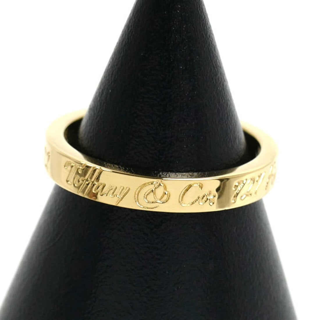 TIFFANY&Co. Tiffany & Co. 18K Yellow Gold Notes Narrow New York Ring (3.1g) for Women: --- Catalog ---Category: SizeUS Size: 3.5Brand Size: 46.5Category: DesignType: Band ringGender: WomenMaterial: Yellow gold (18K)Category: GeneralBrand: TiffanyCountry of Origin: USA--- Item List ---Se