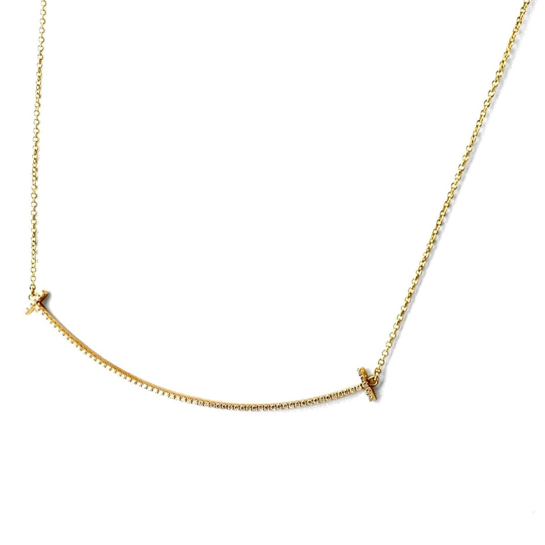 Tiffany & Co. T Smile Necklace Pendant Large Melee Diamond 750 Women's: --- Catalog ---Category: SizePendant Size: 12.9mm x 68.8mm / 0.5'' x 2.7''Neck Circumference: 45.5 cm / 17.91''Category: DesignGender: WomenMaterial: Yellow gold (18K)Pendant Type: PendantNecklace Typ