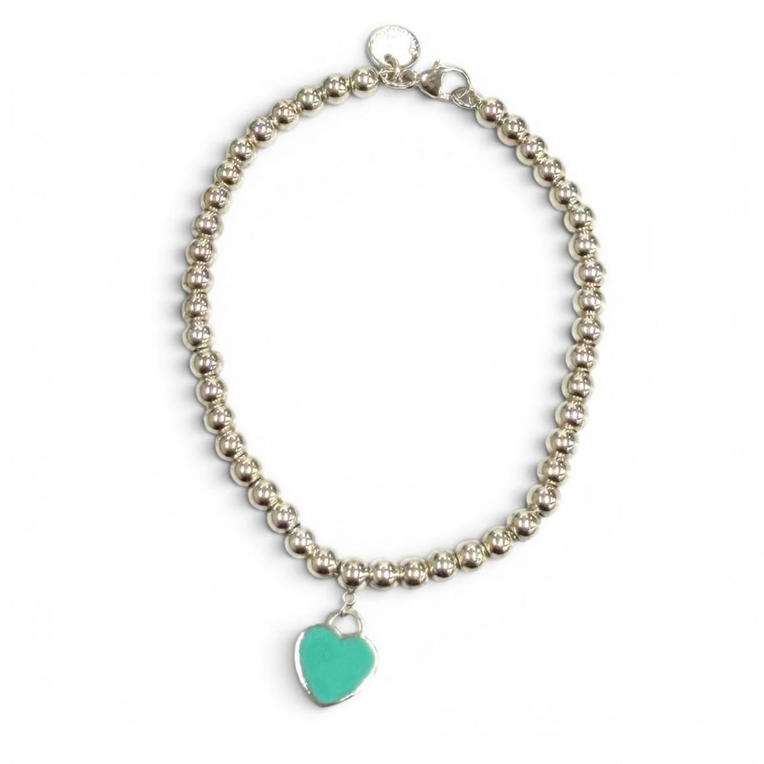 TIFFANY&Co. Tiffany Return to Mini Heart Tag Bead Bracelet AG925 Silver Blue Weight 6.8g Comes with: --- Catalog ---Category: SizeLength: 17.5cm / 6.88''Category: DesignType: Charm braceletColor: Blue, SilverGender: WomenMaterial: Silver 925Category: GeneralBrand: Tiffany--- Item List ---Section: Con