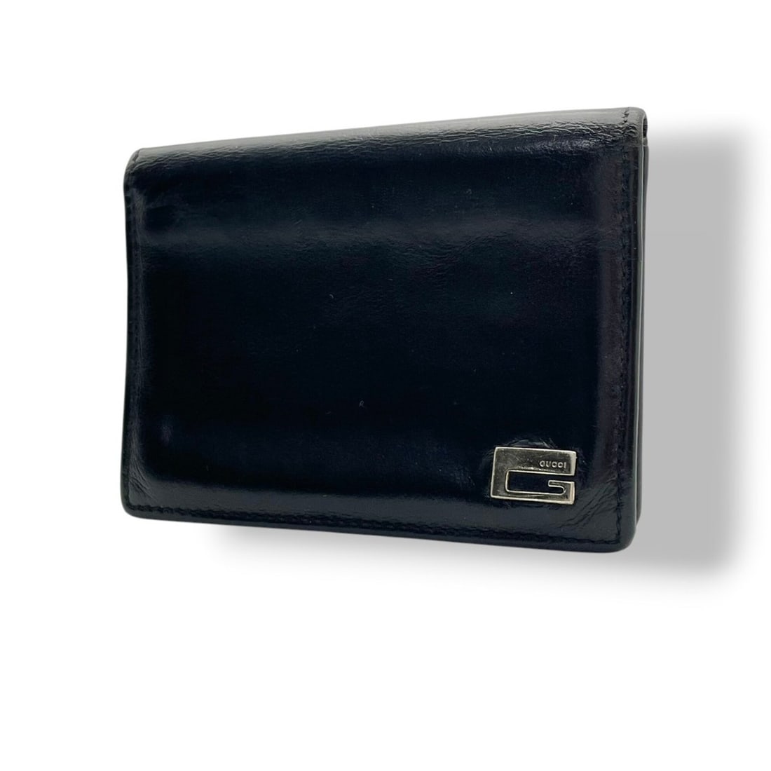 Gucci business card holder/card case, leather, black, silver hardware, men's/women's, W3: --- Catalog ---Category: DesignType: Business card caseColor: BlackGender: Men,WomenMaterial: Leather Category: GeneralMPN: 033-0416Brand: GucciCountry of Origin: ItalyCategory: Physical PropertiesSiz
