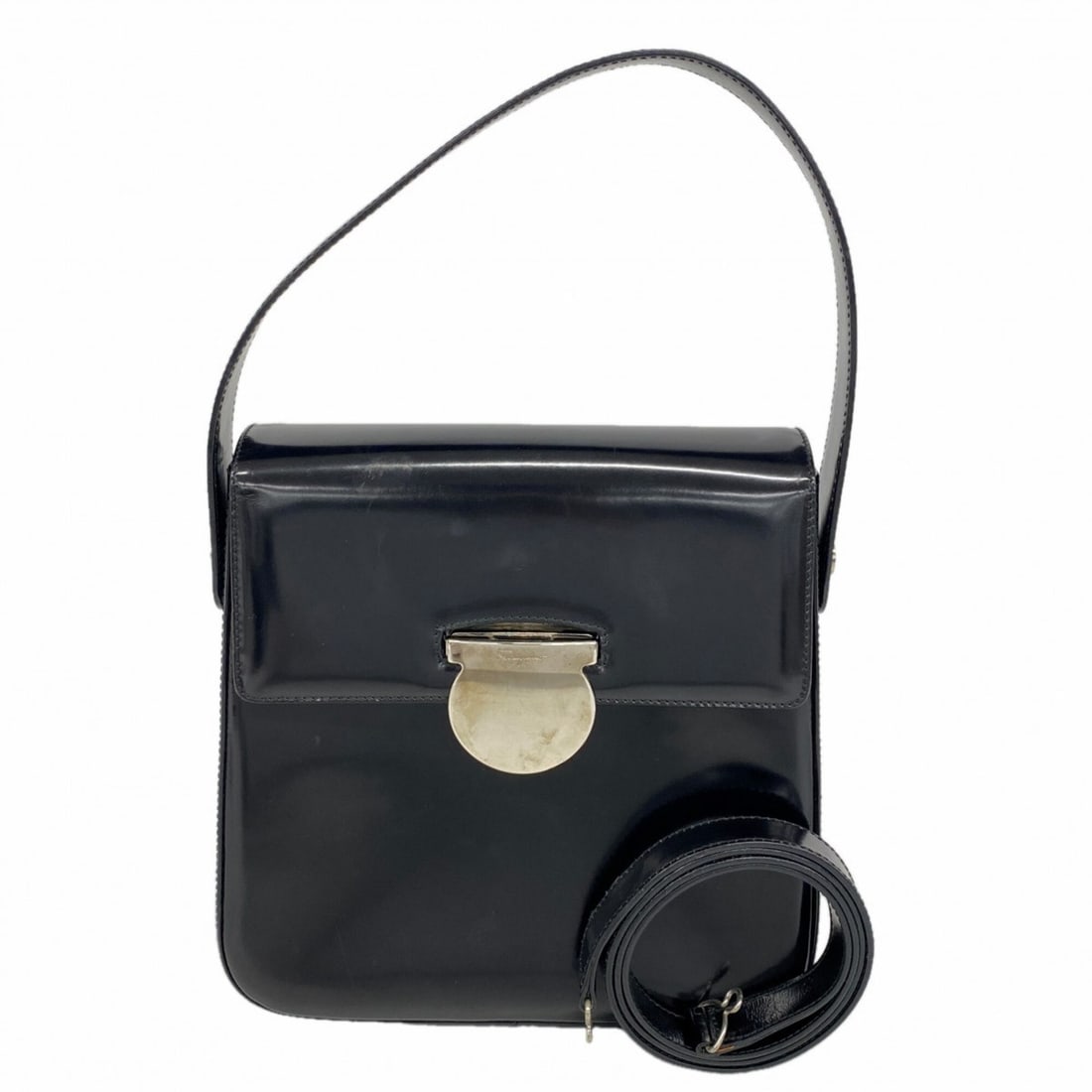 Salvatore Ferragamo Gancini enamel black 2-way handbag for women: --- Catalog ---Category: SizeSize (HxWxD): 22cm x 21cm x 7.5cm / 8.66'' x 8.26'' x 2.95''Category: DesignType: HandbagColor: BlackGender: WomenHardware Color: SilverCategory: GeneralBrand: Salvatore F
