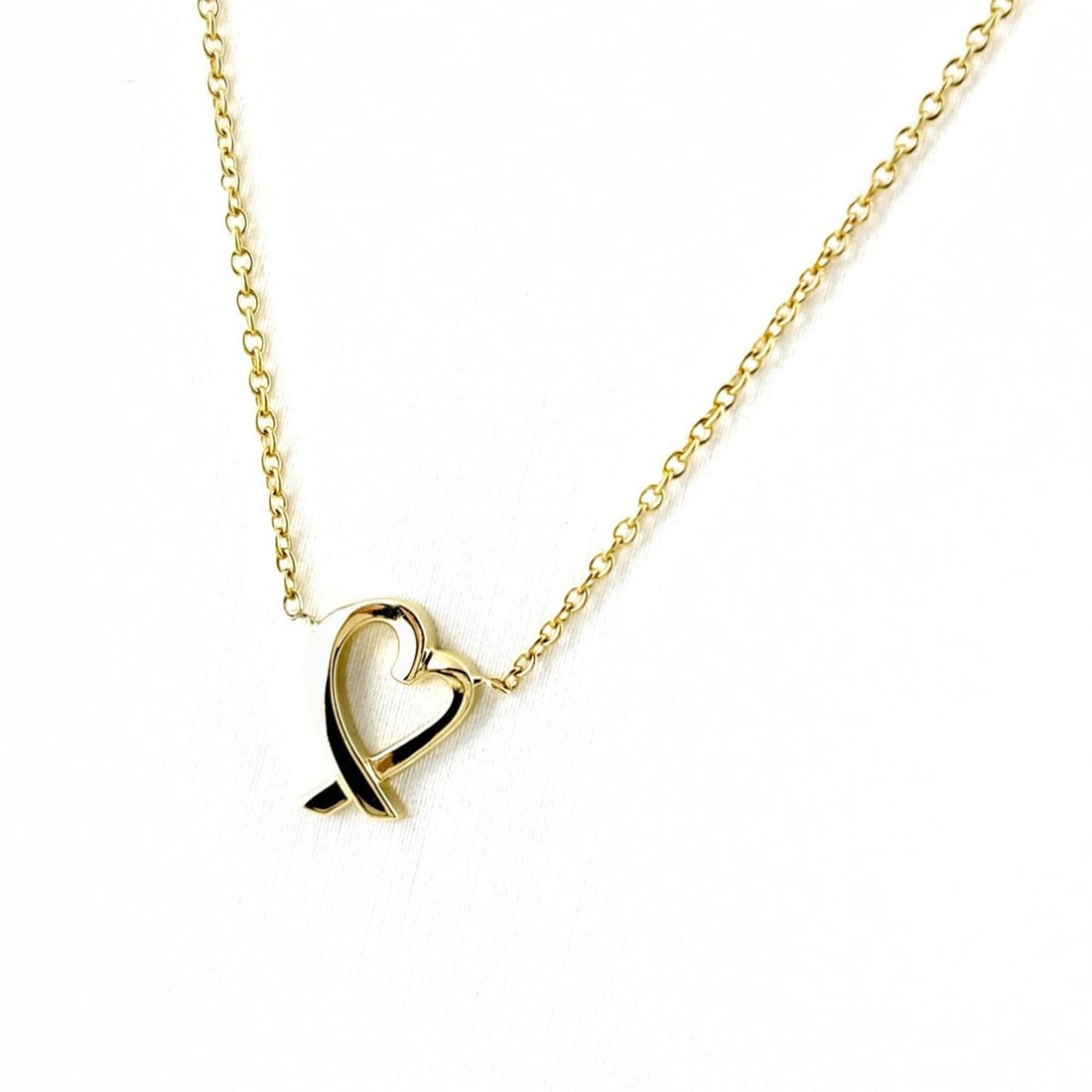 Tiffany & Co. Loving Heart Necklace, Yellow Gold (YG) Pendant, Elsa Peretti Design, 750 Diamond,: --- Catalog ---Category: SizePendant Size: 9.9mm x 9.6mm / 0.38'' x 0.37''Neck Circumference: 48 cm / 18.89''Category: DesignGender: WomenMaterial: Yellow gold (18K)Pendant Type: PendantNecklace Type: