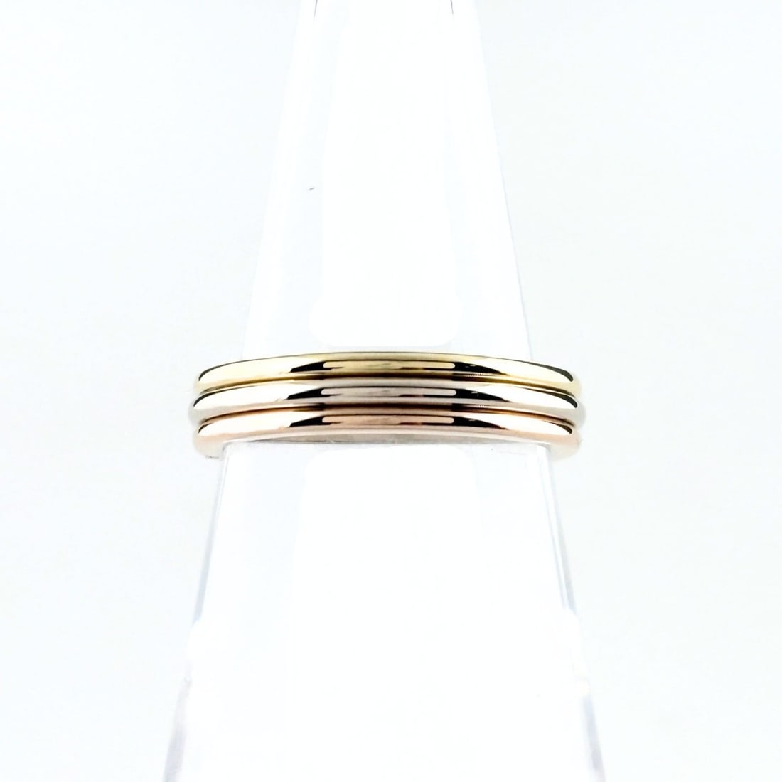 Cartier Trinity Ring, available in yellow gold (YG), pink (PG), and white (WG). Three-color design,: --- Catalog ---Category: SizeJP Size: 10.5US Size: 5.5Category: DesignType: Band ringGender: WomenMaterial: Pink gold (18K), White gold (18K), Yellow gold (18K)Category: GeneralBrand: Cartier--- Item 