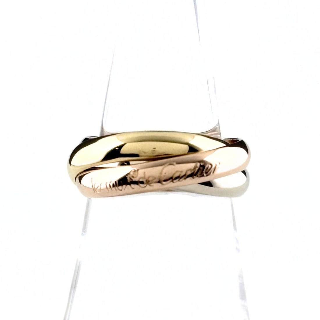 Cartier Trinity Ring, available in yellow gold (YG), pink (PG), and white (WG). Three-color design,: --- Catalog ---Category: SizeJP Size: 13US Size: 6.5Category: DesignType: Band ringGender: WomenMaterial: Pink gold (18K), White gold (18K), Yellow gold (18K)Category: GeneralBrand: Cartier--- Item Li