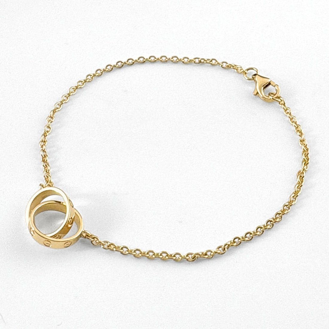 Cartier Baby Love Bracelet YG Yellow Gold 750 Women's: --- Catalog ---Category: SizeLength: 18cm / 7.08''Category: DesignType: Charm braceletGender: WomenMaterial: Yellow gold (18K)Category: GeneralBrand: Cartier--- Item List ---Section: ConditionRanking: