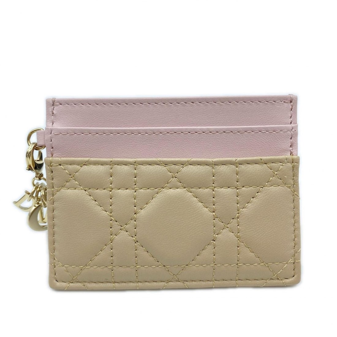 Christian Dior Lambskin Lady Freesia Card Holder S0974OBWS Business Holder/Card Case Beige Pink: --- Catalog ---Category: DesignType: Card caseColor: Beige pinkGender: WomenClosure: OpenMaterial: Leather Leather/Fur Type: LambskinCategory: GeneralBrand: Christian DiorCategory: Physical Properties