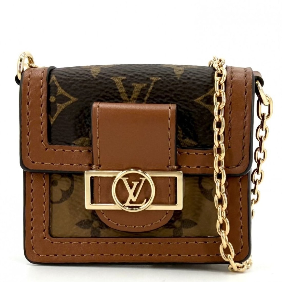 Louis Vuitton Micro Dauphine Chain Shoulder Bag for Women, M80250, Brown with Gold Hardware. A: --- Catalog ---Category: SizeSize (HxWxD): 6cm x 7cm x 2.5cm / 2.36'' x 2.75'' x 0.98''Category: DesignType: Shoulder bagColor: BrownGender: WomenMaterial: Monogram Reverse Category: GeneralBrand: Lou