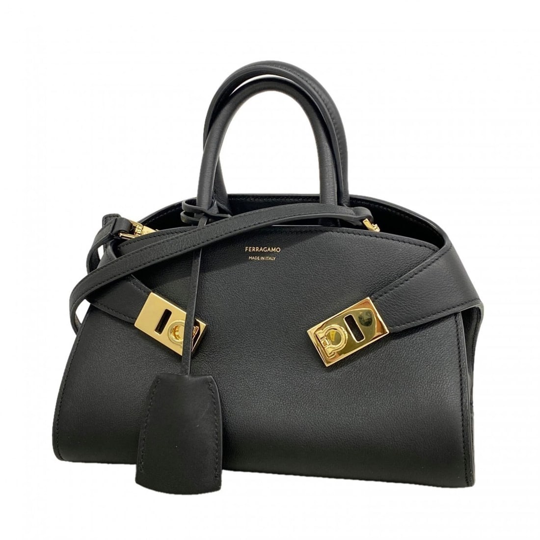 Salvatore Ferragamo Gancini Hug Mini 21 Leather Handbag, Black, 2-way Bag for Women: --- Catalog ---Category: SizeSize (HxWxD): 15.5cm x 22.5cm x 13cm / 6.1'' x 8.85'' x 5.11''Category: DesignType: HandbagColor: BlackGender: WomenMaterial: Leather Hardware Color: GoldCategory: General