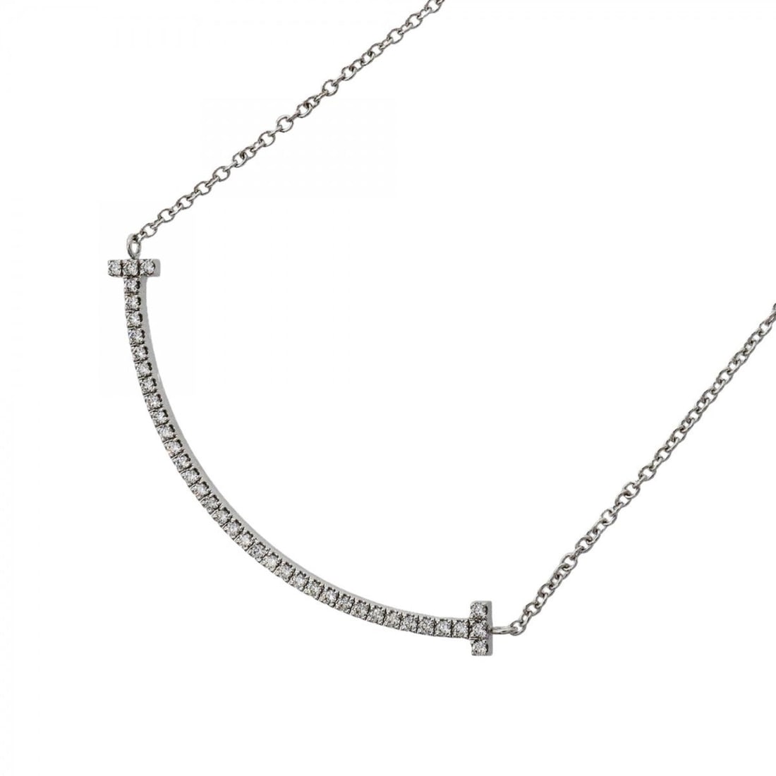Tiffany & Co. T Smile Small Necklace, 18K White Gold, Diamond, Women's: --- Catalog ---Category: SizePendant Size: 10mm x 37mm / 0.39'' x 1.45''Neck Circumference: 40.5 cm / 15.94''Category: DesignStone: DiamondGender: WomenMaterial: White gold (18K)Necklace Type: Necklac