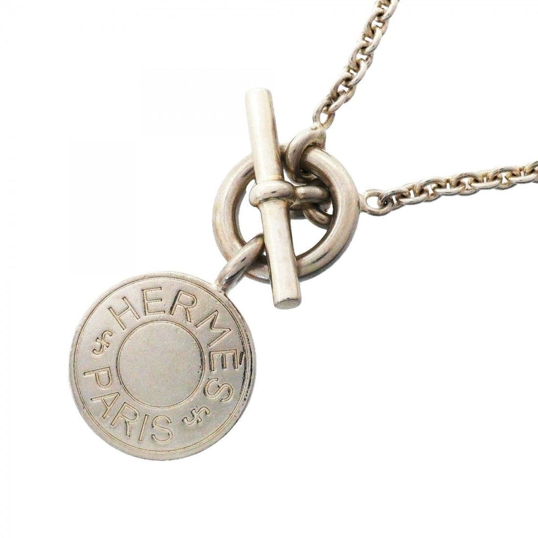 Hermes Necklace, Sellier Amulet, Sterling Silver 925, Women's: --- Catalog ---Category: SizePendant Size: 19.4mm x 13.9mm / 0.76'' x 0.54''Neck Circumference: 40.5 cm / 15.94''Category: DesignGender: WomenMaterial: Silver 925Pendant Type: AmuletNecklace Type: Nec