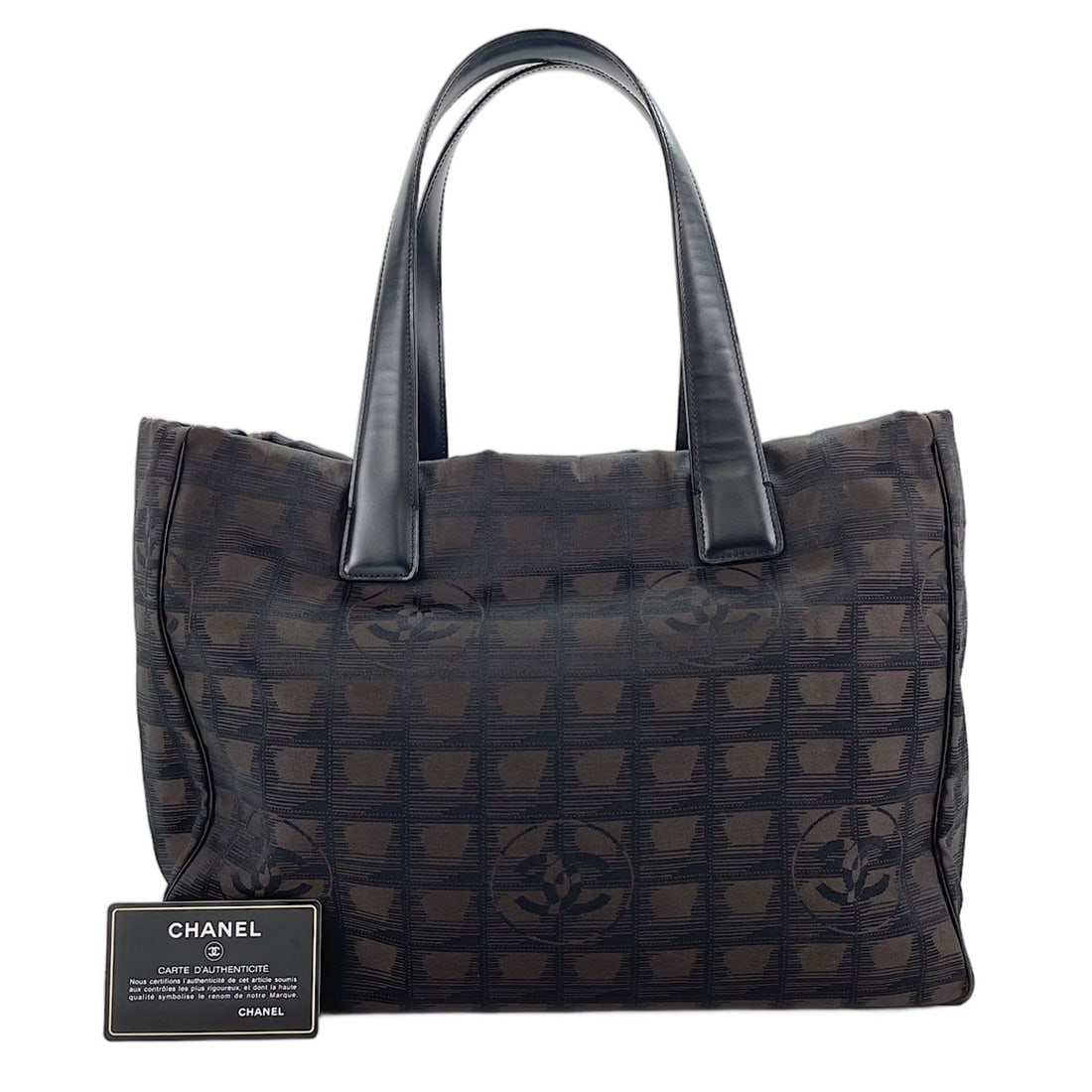 Chanel New Travel Line Tote Bag, Brown: --- Catalog ---Category: SizeSize (HxWxD): 26cm x 35cm x 15cm / 10.23'' x 13.77'' x 5.9''Category: DesignType: Tote bagColor: BrownGender: WomenMaterial: New Travel Line Category: GeneralBrand: Chanel