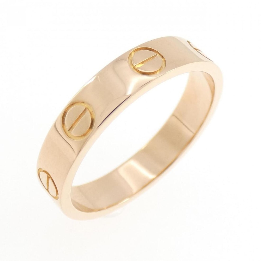 Cartier Mini Love Ring: --- Catalog ---Category: SizeUS Size: 5.5Brand Size: 50Category: DesignType: Band ringGender: WomenMaterial: Pink gold (18K)Category: GeneralBrand: Cartier--- Item List ---Section: ConditionRanking:
