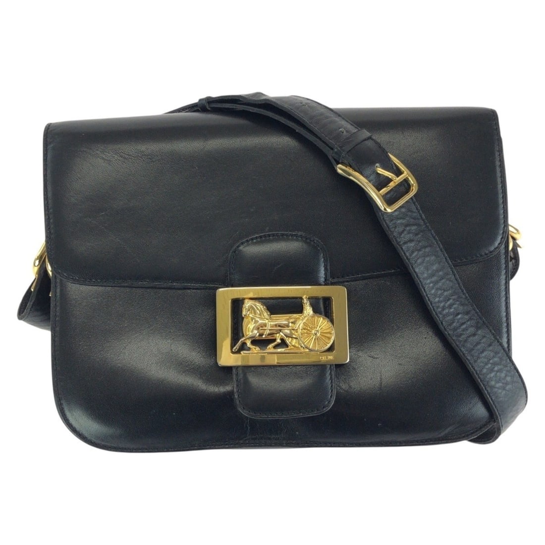 CELINE Vintage Horse Carriage Leather Shoulder Bag in Black with Gold Hardware - Women's: --- Catalog ---Category: SizeSize (HxWxD): 17cm x 23.6cm x 5cm / 6.69'' x 9.29'' x 1.96''Category: DesignType: Shoulder bagColor: BlackGender: WomenMaterial: Leather Category: GeneralBrand: CelineCoun
