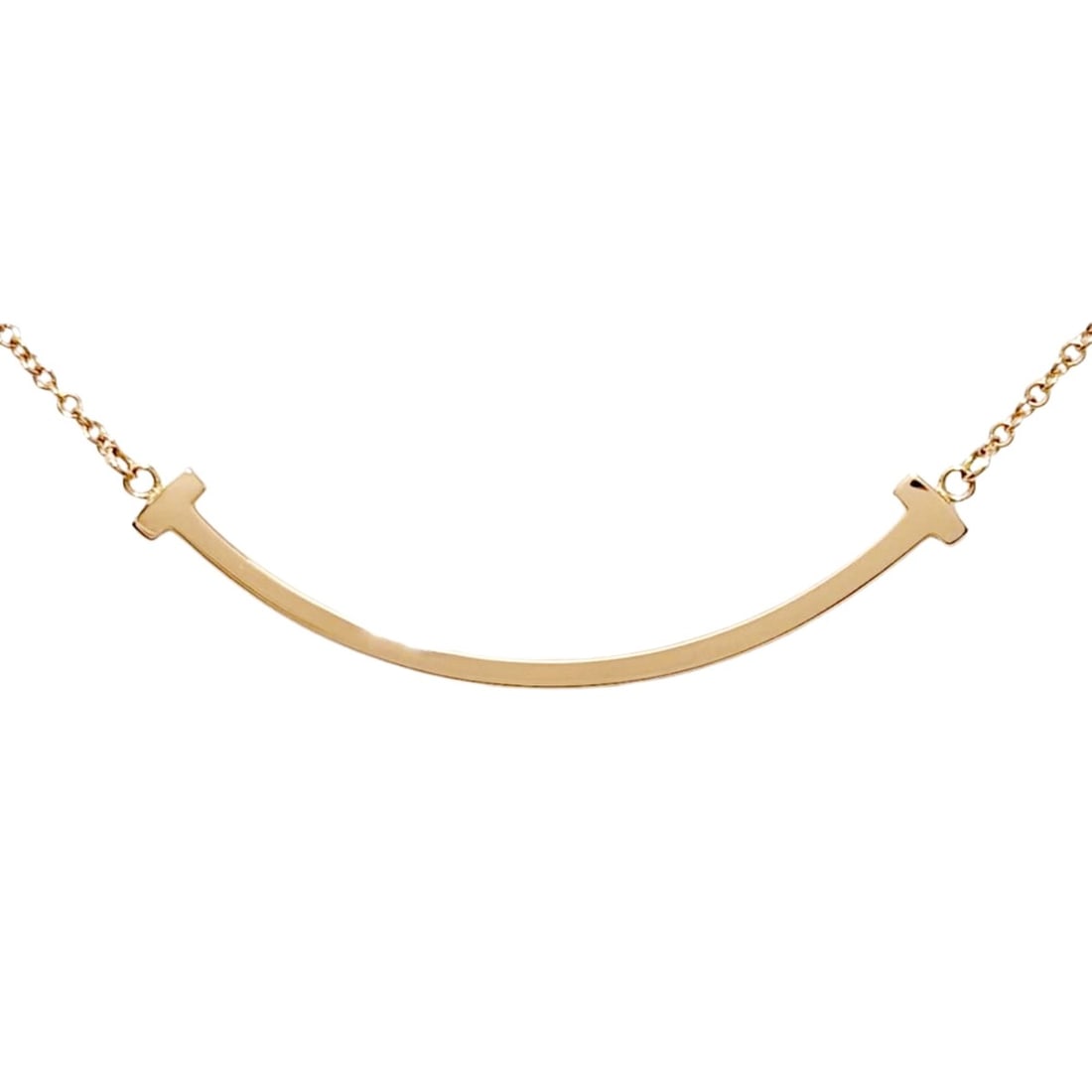 Tiffany & Co. T Smile Small Necklace, 18K Pink Gold, 2.7g, Women's.: --- Catalog ---Category: SizePendant Size: 37mm / 1.45''Neck Circumference: 45 cm / 17.71''Category: DesignColor: Pink goldGender: WomenMaterial: Pink gold (18K)Necklace Type: NecklaceCategory: Genera