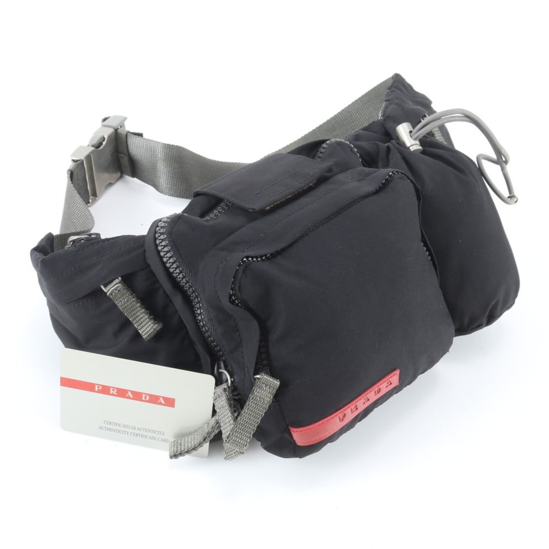 Prada Sport 4VA056 2-Way Body Bag/Waist Pouch (Black) - Men's with Guarantee Card: --- Catalog ---Category: SizeSize (HxWxD): 14cm x 30cm x 5cm / 5.51'' x 11.81'' x 1.96''Category: DesignColor: BlackGender: WomenCategory: GeneralMPN: 4VA056Brand: PradaCountry of Origin: Italy--- Ite