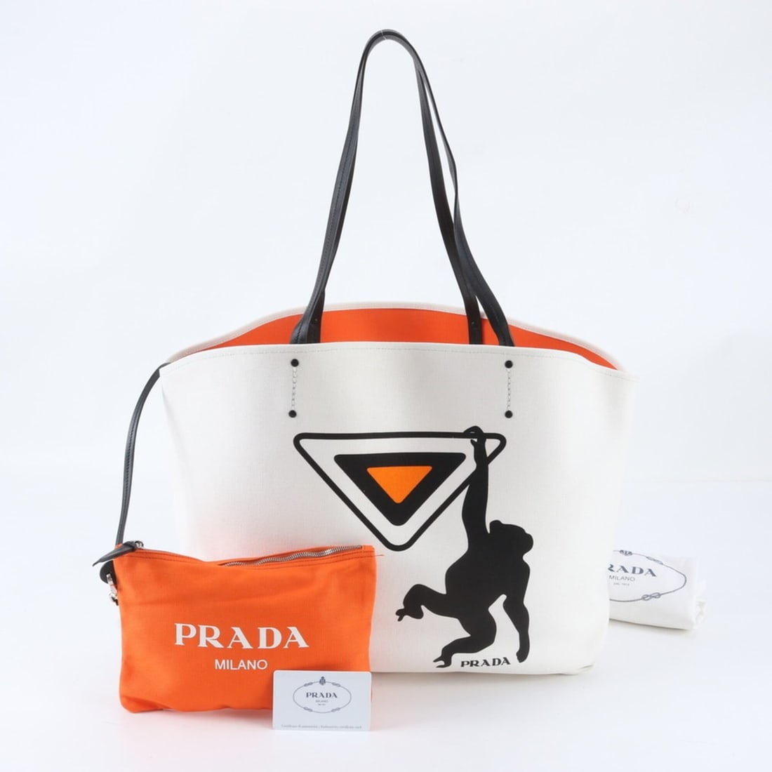 Prada Canapa Monkey Print Tote Bag/Handbag, Leather, Men's, with Guarantee Card. (1BG218): --- Catalog ---Category: SizeStrap Drop: 5cm / 1.96''Size (HxWxD): 15cm x 45cm x 14cm / 5.9'' x 17.71'' x 5.51''Category: DesignType: Handbag, Pouch, Tote bagColor: Black, Orange, WhiteGender: MenMate