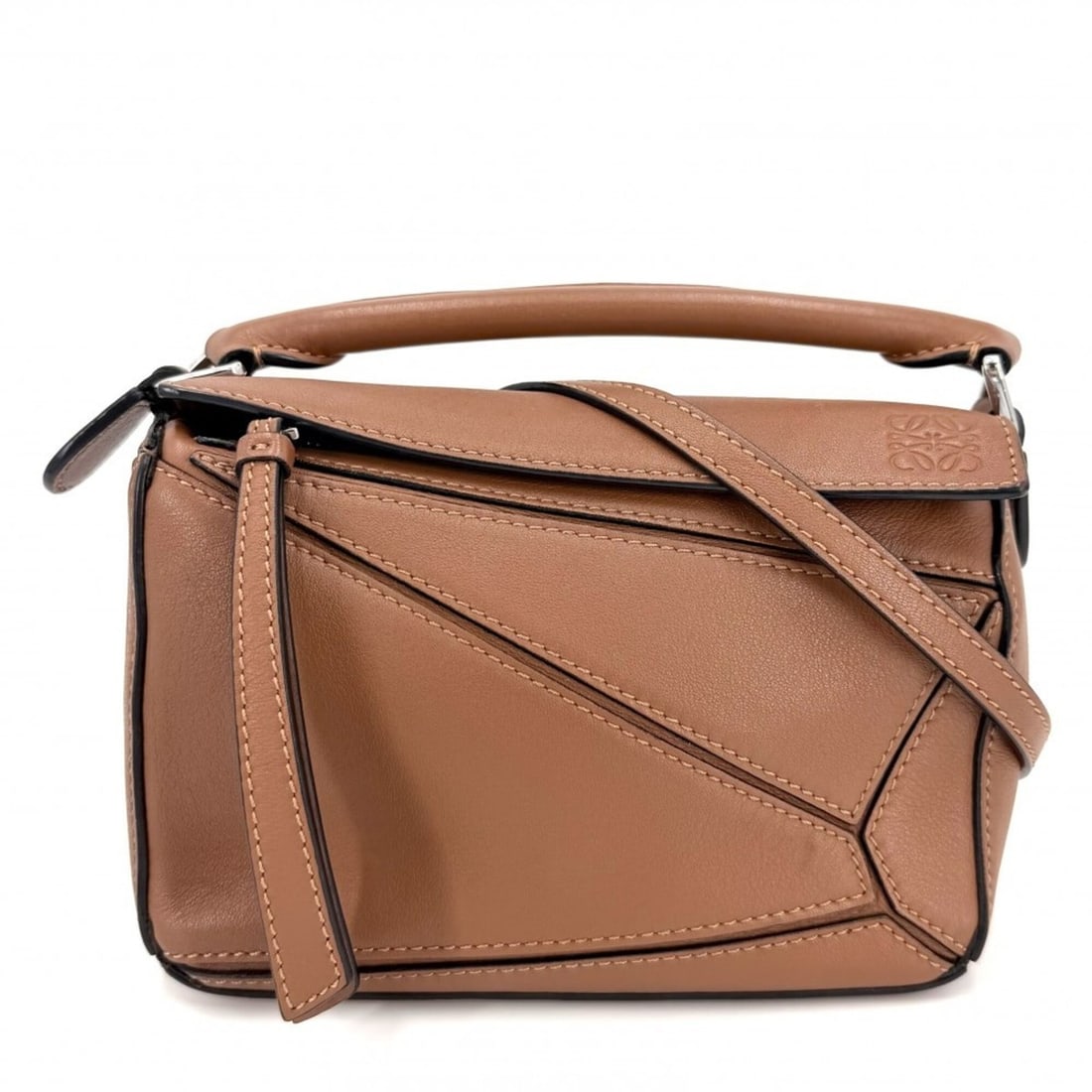 Loewe Women's Puzzle Bag Nano Handbag Shoulder Crossbody Small Leather Brown Silver Hardware: --- Catalog ---Category: SizeSize (HxWxD): 12cm x 17cm x 7cm / 4.72'' x 6.69'' x 2.75''Category: DesignType: Handbag, Shoulder bagColor: BrownGender: WomenMaterial: Leather Category: GeneralBrand: Loe