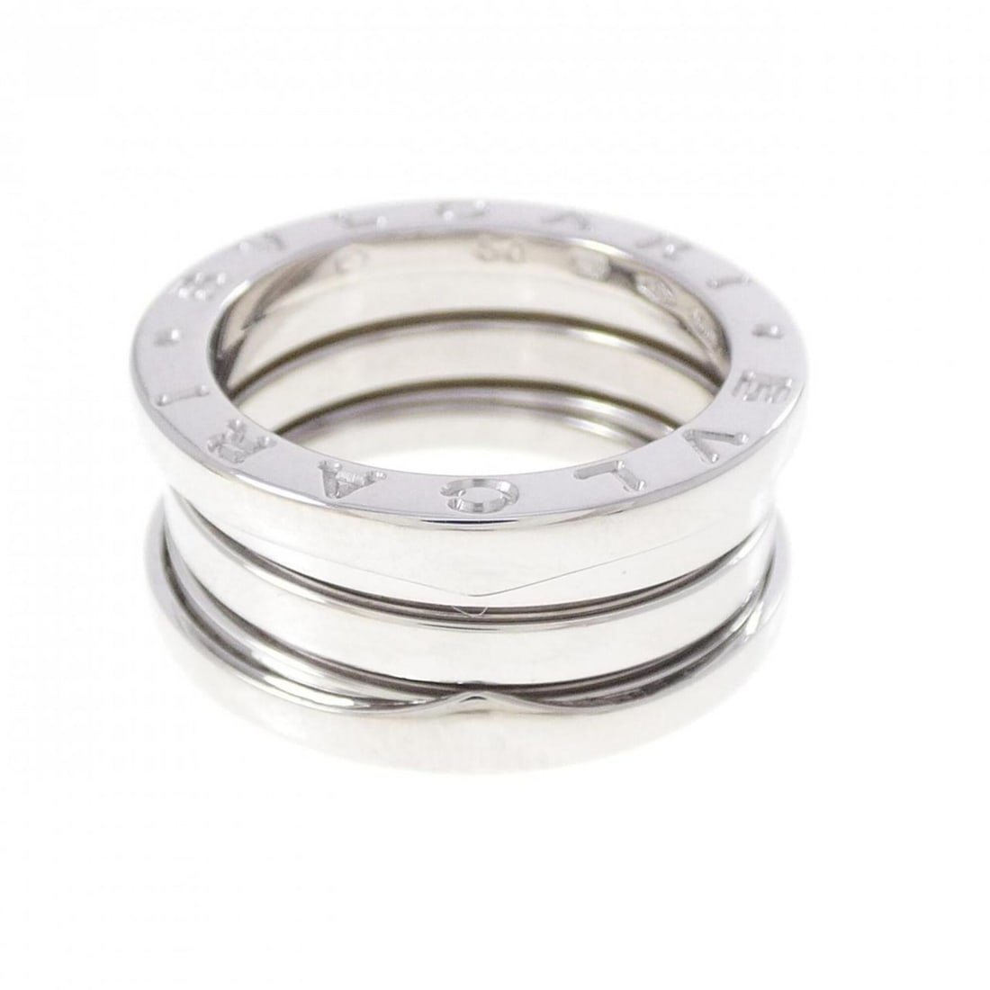 Bvlgari B.zero1 3-band ring: --- Catalog ---Category: SizeUS Size: 5.5Brand Size: 50Category: DesignType: Band ringColor: White goldGender: WomenMaterial: White gold (18K)Category: GeneralBrand: Bvlgari--- Item List ---Section: C