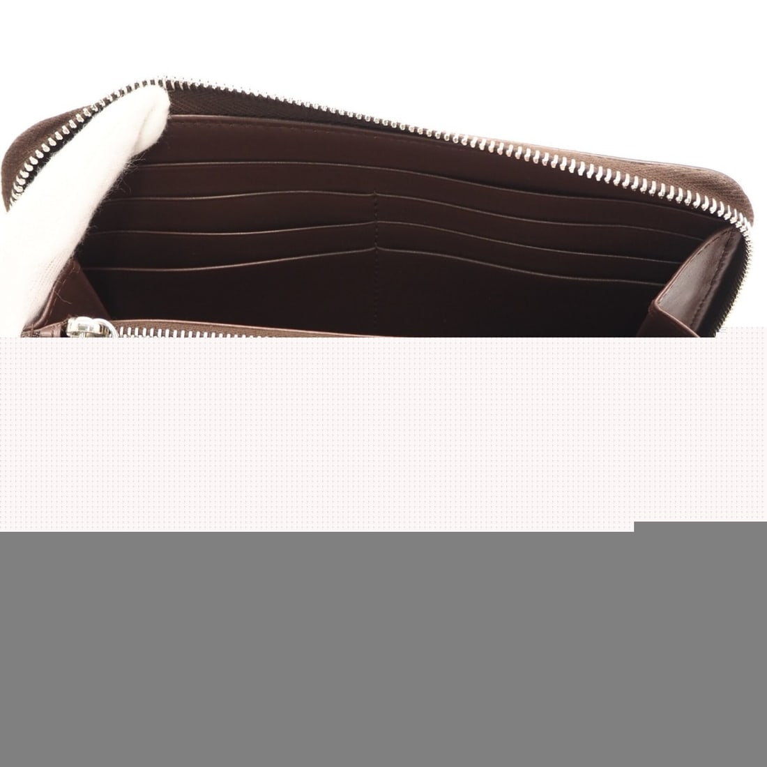 PRADA Vitello Daino Leather Triangle Logo Round Zipper Long Wallet 2ML317 Brown Calf Men's: --- Catalog ---Category: SizeSize (HxWxD): 10.5cm x 19.5cm x 2cm / 4.13'' x 7.67'' x 0.78''Category: DesignType: Long wallet (bi-fold)Color: BrownGender: MenClosure: ZipperMaterial: Leather Leather/Fu