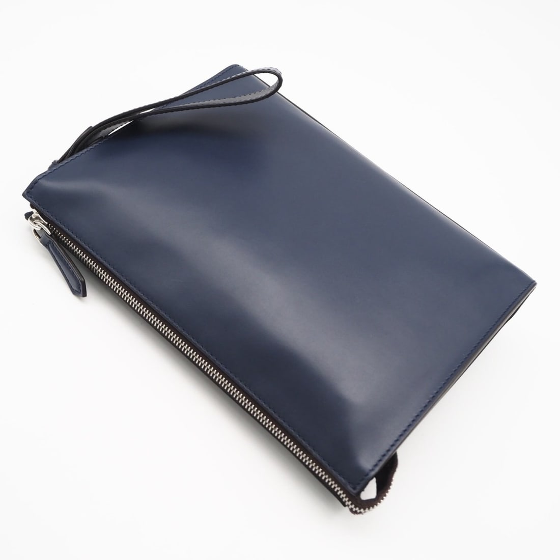 FENDI Calfskin Roma Clutch Bag 7VA491, Navy Calf Leather Bag, Men's: --- Catalog ---Category: SizeSize (HxWxD): 20cm x 27cm x 5cm / 7.87'' x 10.62'' x 1.96''Category: DesignType: Clutch bagColor: NavyGender: MenClosure: ZipperMaterial: Leather Leather/Fur Type: Calfski