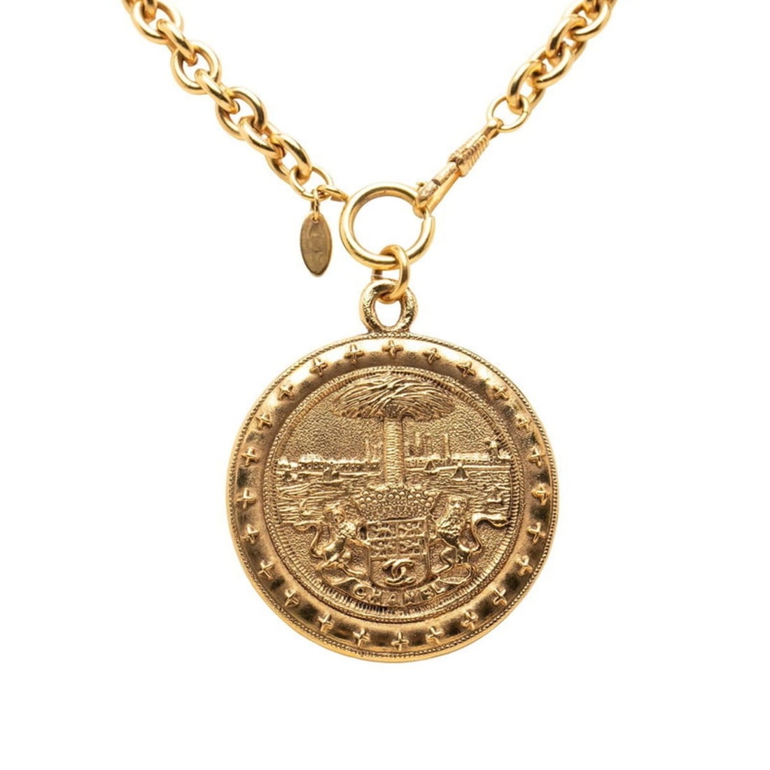 Chanel Coco Mark Palm Tree Lion Medal Chain Necklace Pendant Gold Plated Women's CHANEL: --- Catalog ---Category: SizePendant Size: 70.3mm x 60.2mm / 2.76'' x 2.37''Neck Circumference: 75 cm / 29.52''Category: DesignColor: GoldGender: WomenMaterial: Gold platingPendant Type: PendantNeckla