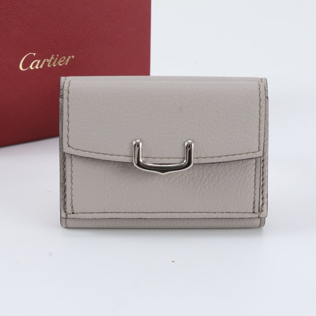 Cartier C de Leather Tri-fold Wallet, Compact Brand Name, Women's: --- Catalog ---Category: SizeSize (HxWxD): 7cm x 9cm x 1cm / 2.75'' x 3.54'' x 0.39''Category: DesignType: Wallet (tri-fold)Color: BeigeGender: WomenMaterial: Leather Inner Pocket: Bill slot 1, Coin p