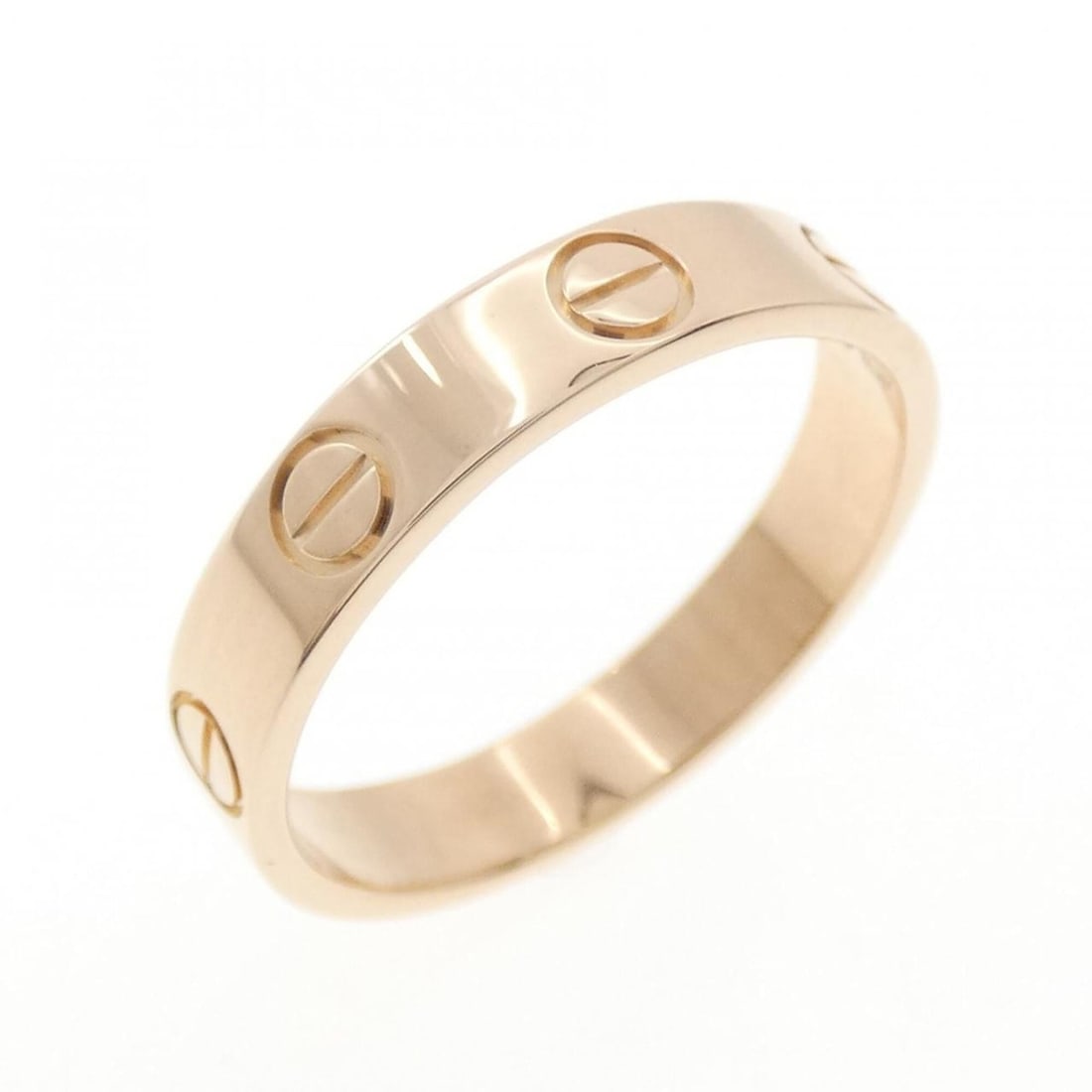 Cartier Mini Love Ring: --- Catalog ---Category: SizeUS Size: 6Brand Size: 51Category: DesignType: Band ringGender: WomenMaterial: Pink gold (18K)Category: GeneralBrand: Cartier--- Item List ---Section: ConditionRanking: