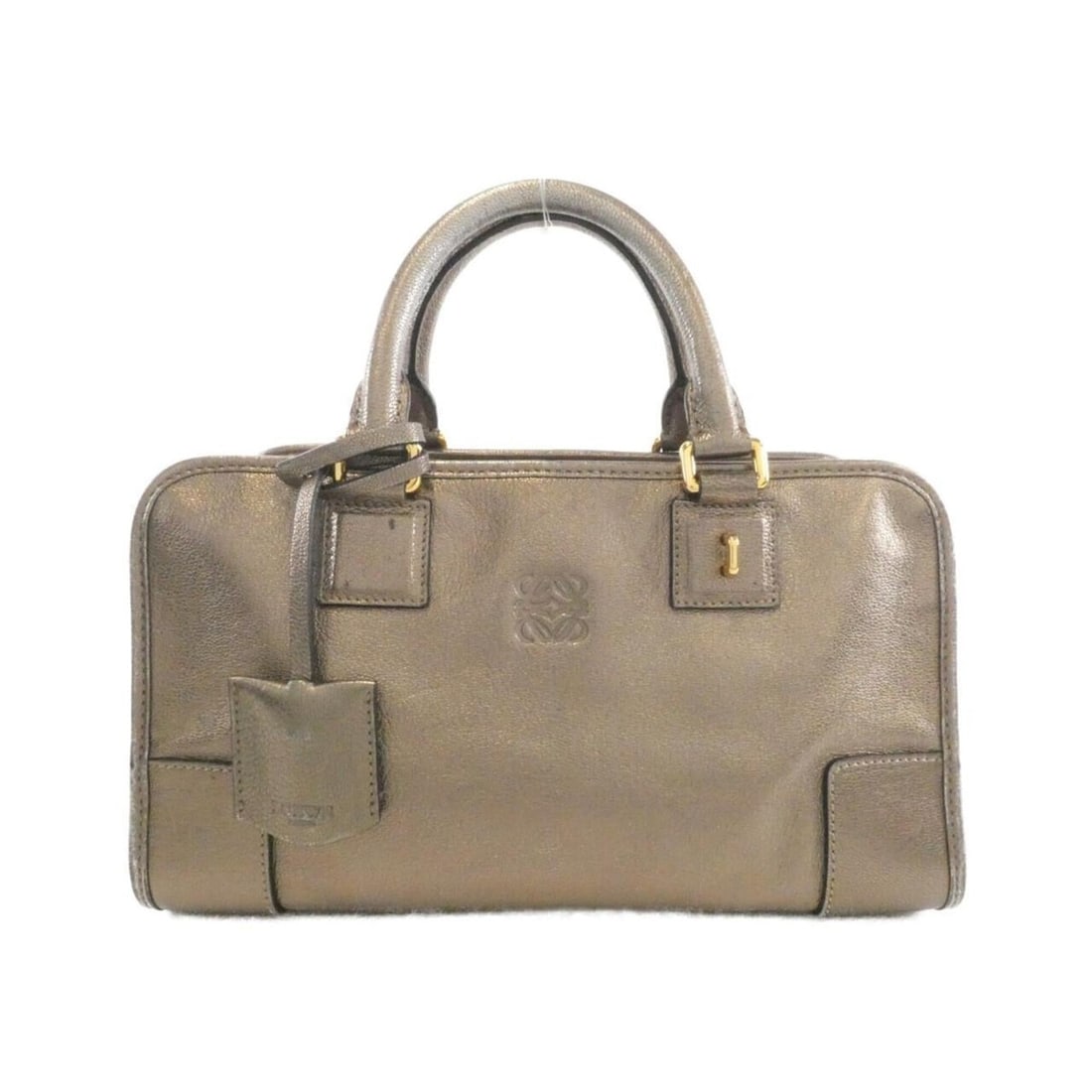 Loewe Amazona 28cm 352 37 A03 Handbag: --- Catalog ---Category: SizeSize (HxWxD): 15cm x 29cm x 13cm / 5.9'' x 11.41'' x 5.11''Category: DesignType: HandbagColor: BronzeGender: WomenMaterial: Leather Leather/Fur Type: GoatskinCategory:
