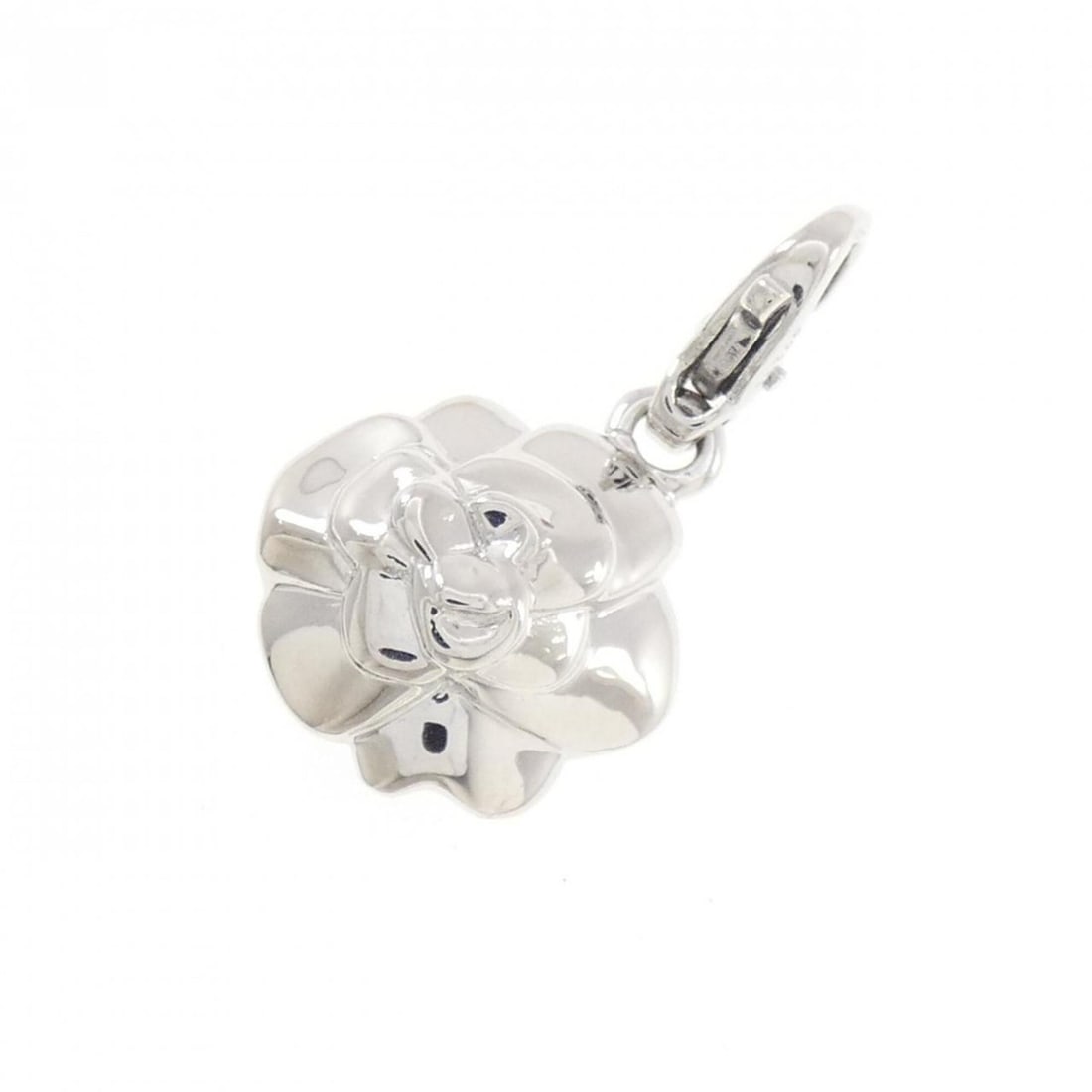 Chanel Camellia Charm: --- Catalog ---Category: SizeSize (HxWxD): 24.30mm x 13.20mm / 0.96'' x 0.52''Category: DesignType: Necklace charmGender: WomenMaterial: White gold (18K)Category: GeneralBrand: Chanel--- Item List ---