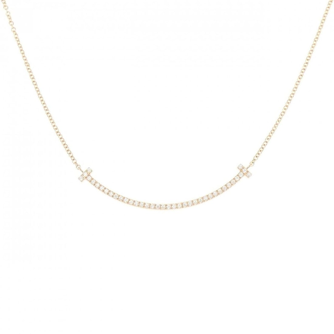 Tiffany T Smile Small Necklace: --- Catalog ---Category: SizePendant Size: 3.5mm x 36.9mm / 0.13'' x 1.45''Neck Circumference: 41 cm / 16.14''Category: DesignGender: WomenMaterial: Pink gold (18K)Pendant Type: PendantNecklace Type: