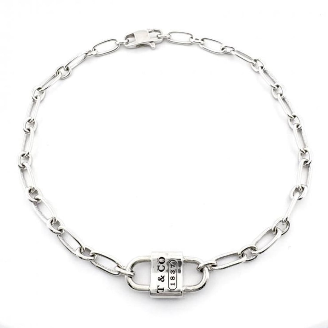 Tiffany & Co. 1837 Small Double Lock Bracelet, 7.4g, Ag925 Silver: --- Catalog ---Category: SizeLength: 21.5cm / 8.46''Category: DesignType: Charm braceletColor: SilverGender: WomenMaterial: Silver 925Category: GeneralBrand: Tiffany--- Item List ---Section: Condition