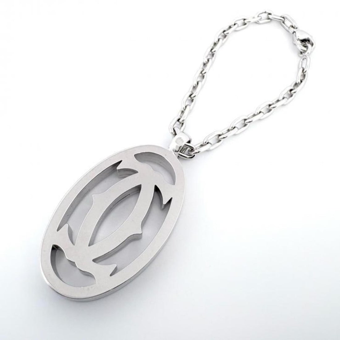 Cartier 2C Double C Decor Keychain Charm Keyring: --- Catalog ---Category: DesignType: KeyringColor: SilverGender: Women,MenMaterial: Stainless steelCategory: GeneralBrand: Cartier--- Item List ---Section: ConditionRanking: Rank B Used - Traces of us