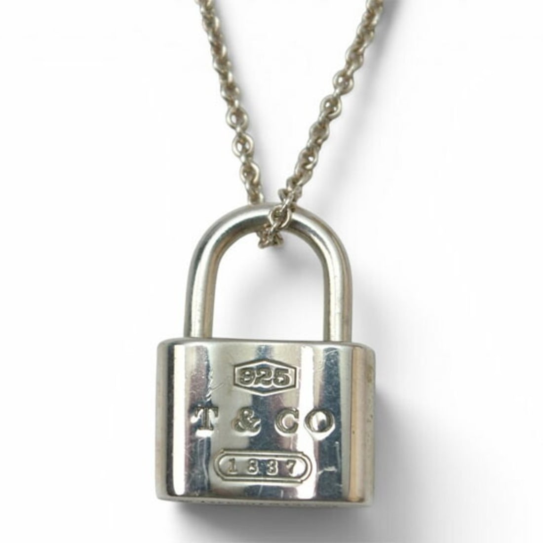 Tiffany & Co. Necklace 1837 Lock Charm SV925 Silver Women's TIFFANY&Co.: --- Catalog ---Category: SizePendant Size: 18mm x 12mm / 0.7'' x 0.47''Neck Circumference: 40 cm / 15.74''Category: DesignColor: SilverGender: WomenMaterial: Silver 925Necklace Type: NecklaceCategory: