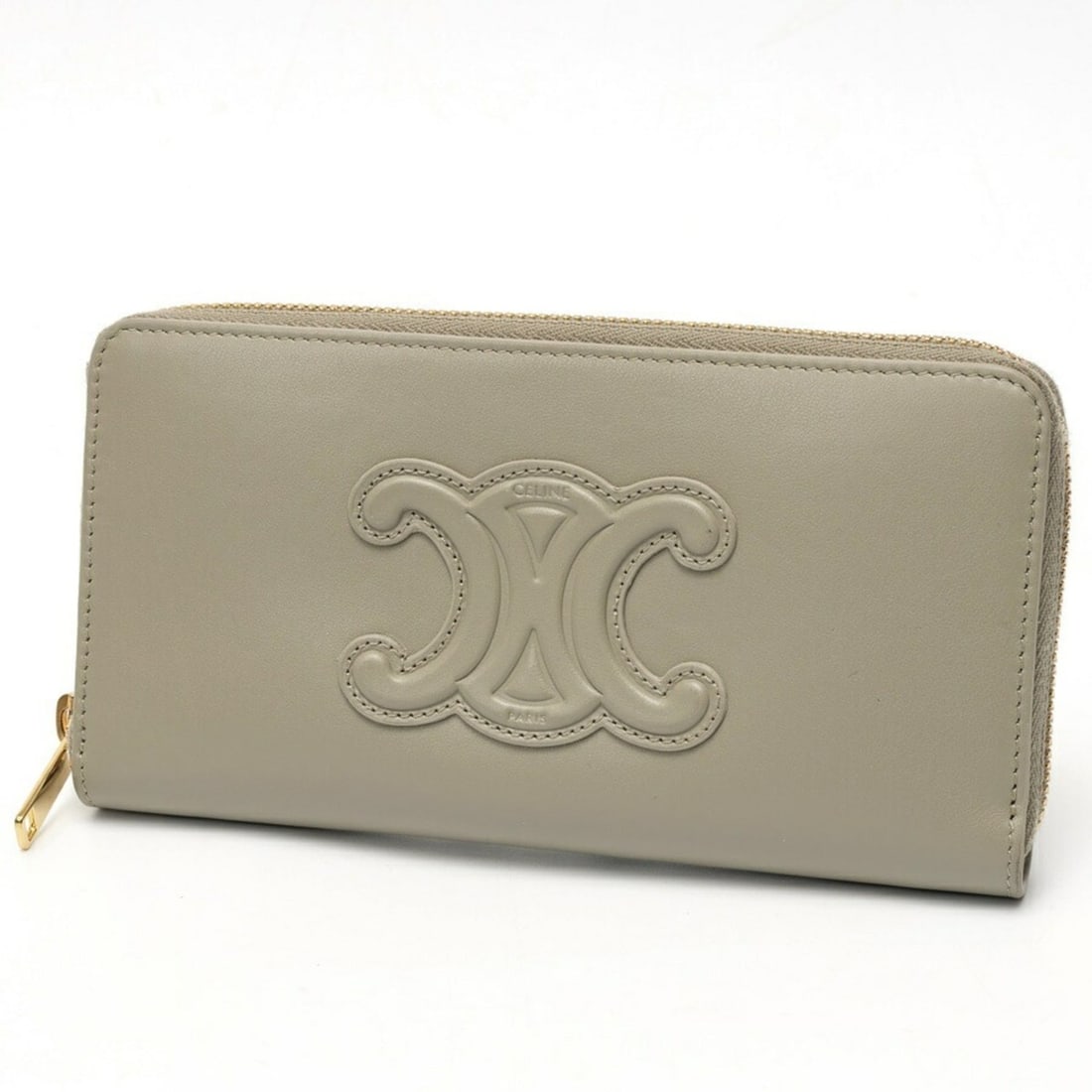 Celine Cuir Triomphe Large Zip Wallet 10K54 Calfskin Light Khaki: --- Catalog ---Category: SizeSize (HxWxD): 10cm x 19cm x 2cm / 3.93'' x 7.48'' x 0.78''Category: DesignType: Long wallet (bi-fold)Gender: WomenMaterial: Leather Leather/Fur Type: Smooth calf leatherCa