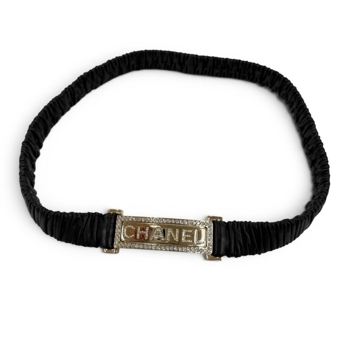 CHANEL B23C Logo Buckle Rhinestone Leather Belt, Black with Gold Hardware, Size 75-30, Made in: --- Catalog ---Category: SizeLength: 72.5cm / 28.54''Category: DesignType: Standard beltColor: BlackGender: WomenLeather/Fur Type: LambskinMaterial (Strap): Leather Category: GeneralMPN: B23CBrand: Ch