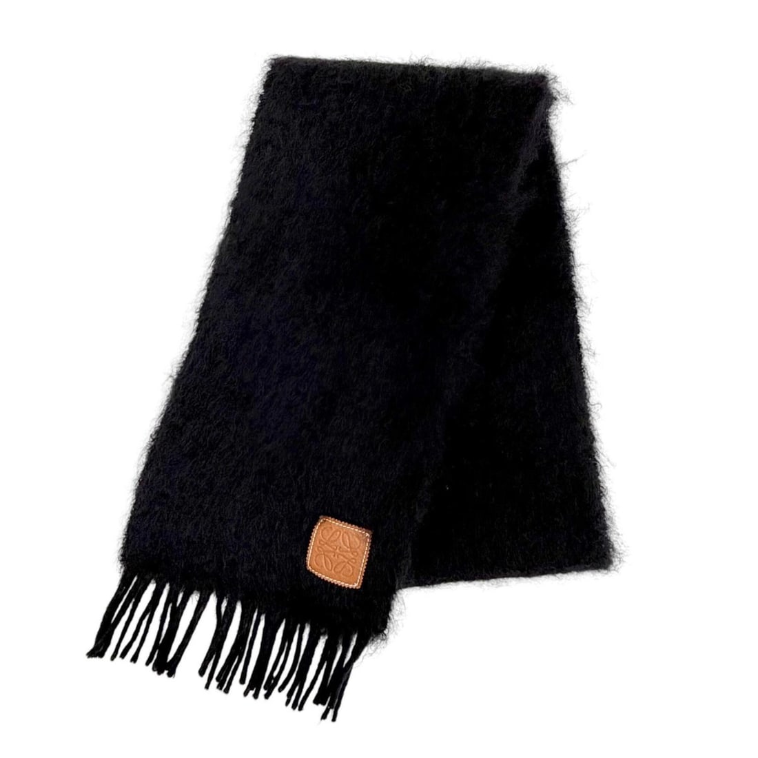 LOEWE Mohair Wool Anagram Leather Patch Fringe Long Stole Scarf, Black, Made in Spain, Authentic,: --- Catalog ---Category: SizeSize (LxW): 1.9m x 24cm / 74.8'' x 9.44''Category: DesignType: StoleColor: BlackGender: WomenMaterial: Mohair , Wool , Nylon Category: GeneralBrand: LoeweCountry of Origin
