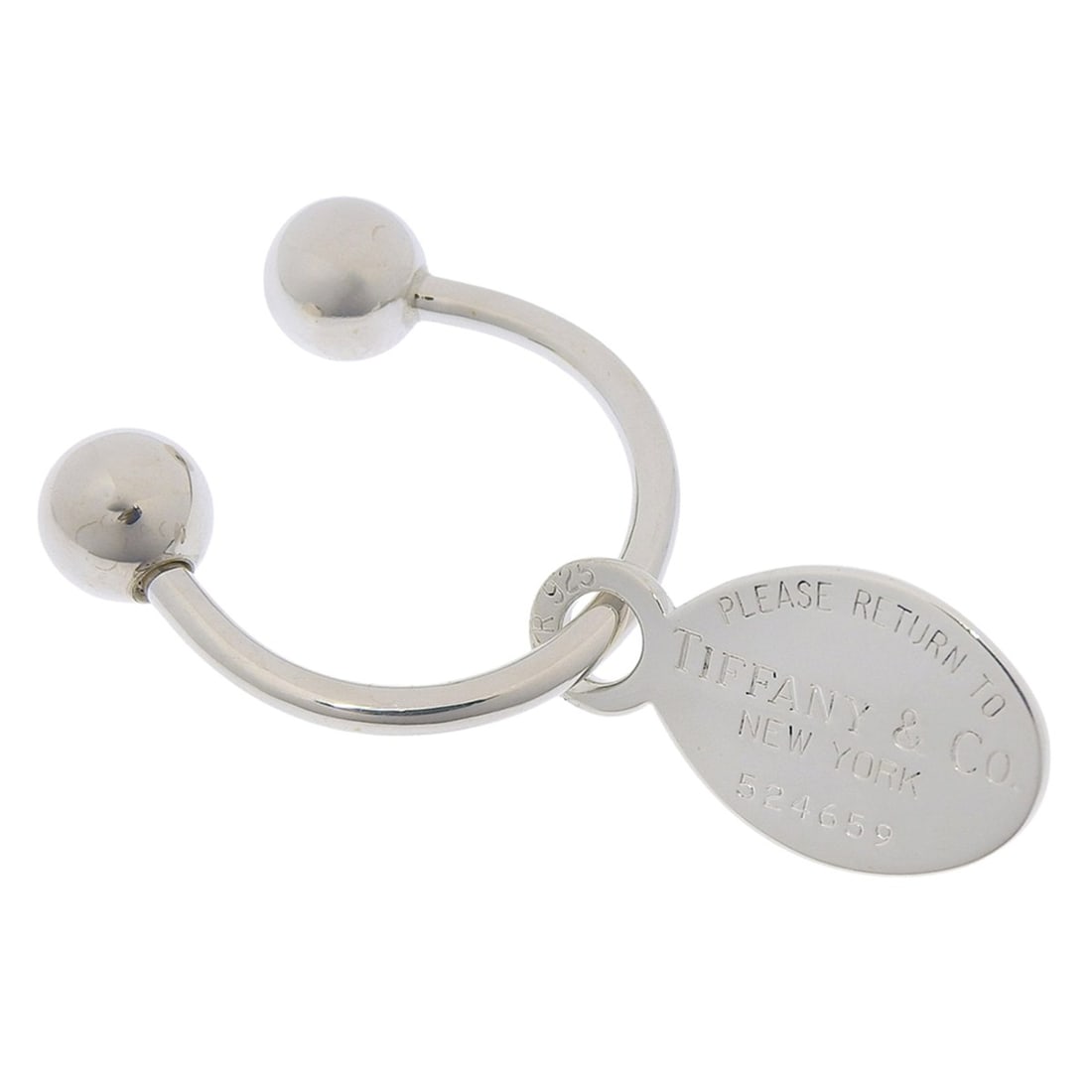 Tiffany & Co. Return to Oval Tag Keyring, Sterling Silver 925, Unisex: --- Catalog ---Category: SizeWeight: 9.6g / 0.33oz.Size (HxWxD): 2.9cm x 1.5cm / 1.14'' x 0.59''Category: DesignType: KeyringGender: UnisexMaterial: Silver 925Category: GeneralBrand: Tiffany--- Item L