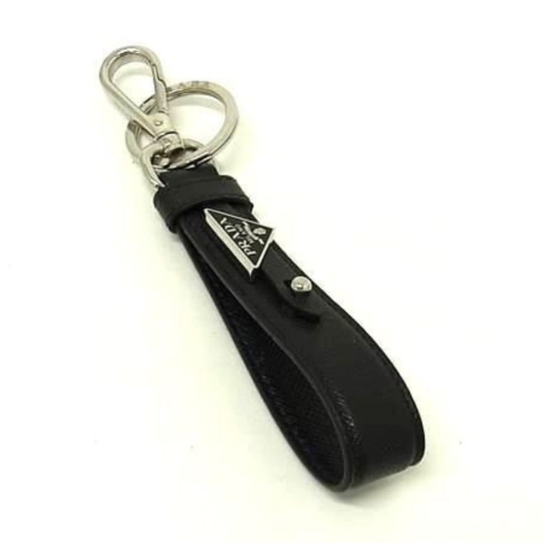 PRADA Triangle Keychain 2PP68T Black Saffiano Leather Men's and Women's: --- Catalog ---Category: SizeSize (HxWxD): 14.5cm x 2cm / 5.7'' x 0.78''Category: DesignType: KeyringColor: BlackGender: Men,Women,UnisexMaterial: LeatherLeather/Fur Type: Saffiano leatherCategory: Ge