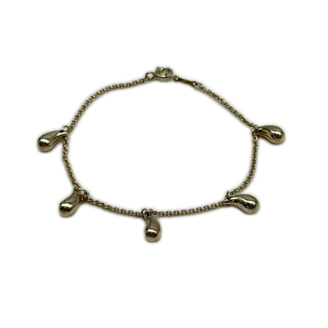 TIFFANY&Co. Elsa Peretti 5 Teardrop Bracelet SV925 - for Women: --- Catalog ---Category: SizeWidth: 1mm / 0.03''Weight: 7g / 0.24oz.Total Length: 17.7cm / 6.96''Category: DesignType: Charm braceletColor: SilverGender: WomenMaterial: Silver 925Category: GeneralBran